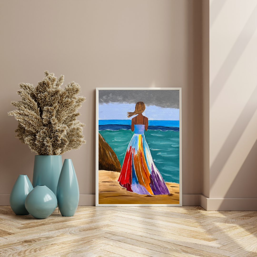 Framed artwork of a woman in a colorful dress on a beach, next to decorative vases.